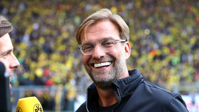 Jürgen Klopp grinst im Interview